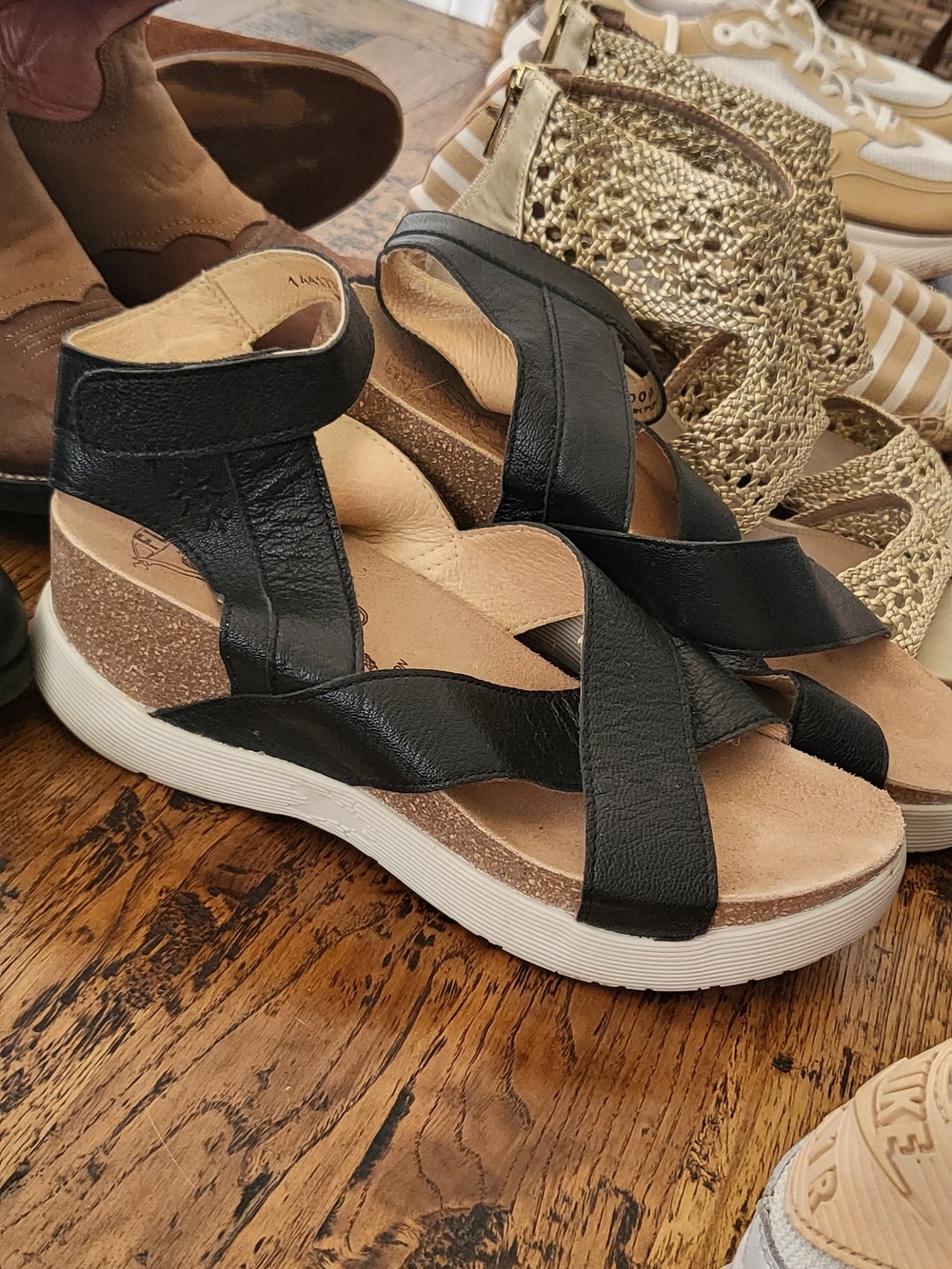 FLY London Women's Black Leather Wedge Sandal with Ankle Strap